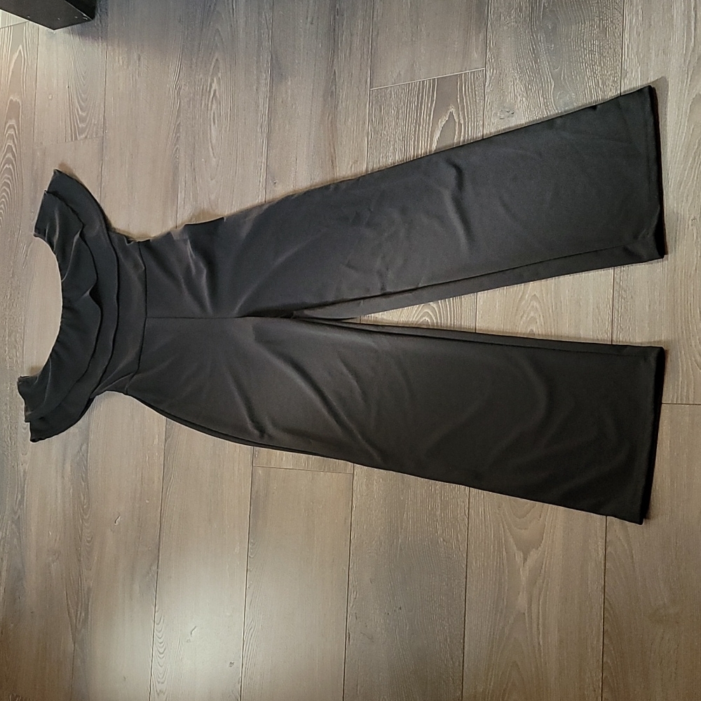 Fashion Nova all black jumpsuit size M